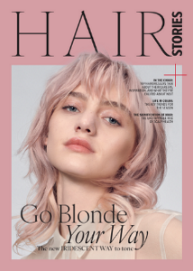 four diverse woman with different hair colors and lenghts, which stand side by side and close to each other looking into the camera while standing in front of a clean grey background